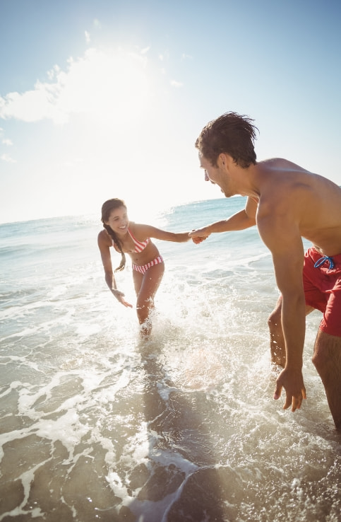 Couple enjoying on the shore of Fuengirola Beach